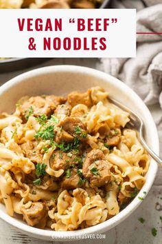 vegan beef and noodles in a white bowl with a spoon on the side text overlay says vegan beef & noodles