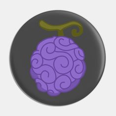 a purple button with swirls on it