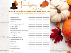 a thanksgiving trinket with pumpkins, gourds and other autumn decorations