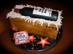 a birthday cake made to look like a wine bottle