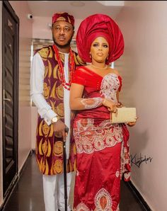 African couple matching outfits for that special occasion. The bride's attire is made up of George fabric majorly worn by the Igbo speaking Part of Nigeria. This outfit can be worn for engagement party, bridal party. Owanbe party, African party etc The bride package consists of a * Red George dress! * Already made headtie/Gele The groom's attire is made from the finest cashmere white material into *Isiagu cap * Trouser * shirt * Isiagu jacket PLEASE NOTE THAT THE DESIGN ON THE GEORGE FABRIC WONT Red Traditional Wear For Marriage, Red Traditional Marriage Wear, Traditional Agbada For Wedding With Traditional Drape, Elegant Red Traditional Wear For Ceremony, Isiagu Styles For Men, Igbo Male Traditional Attire, Elegant Agbada For Wedding With Traditional Drape, Elegant Red Sets With Traditional Patterns, Igbo Groom Traditional Outfit