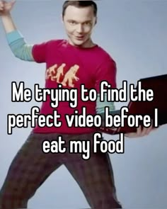 a man holding a laptop computer in his hands with the words me trying to find the perfect video before i eat my food