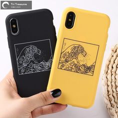 two cases that are next to each other on a white surface, one has a black and yellow phone case with an image of a wave