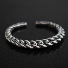 FREE SHIPPING This premium Viking armring based on a find from Bryungs, Gotland is for true connoisseurs of Viking Age art, who appreciate historical authenticity and the tremendous work that goes into crafting a massive piece like this. The thick, prominent piece has been wholly handmade according to ancient Viking silversmithing techniques with scrupulous attention to details. With so many different components, it is a very complicated process that takes a week's worth of work and absolute top Viking Age Art, Viking Designs, Ancient Vikings, Viking Age, Dragon Head, Viking Jewelry, Velvet Bag, Free Jewelry, Fine Silver