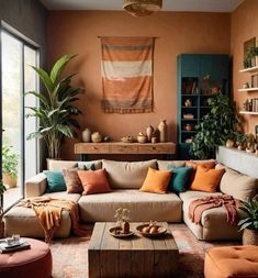 a living room filled with lots of furniture and plants