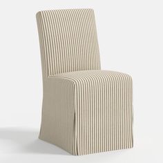 a chair that is made out of ticking fabric