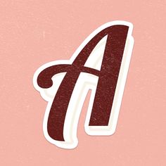 the letter a sticker is shown in red and white on a light pink background