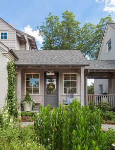 a house with two front doors and windows