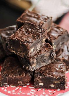 chocolate fudge brownies stacked on top of each other