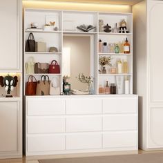 a large white cabinet with many purses and handbags on it's shelves