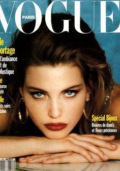 a woman with blue eyes on the cover of a magazine