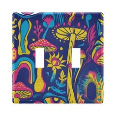 a light switch cover with colorful mushrooms and plants on it's front side, against a dark blue background