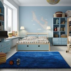 a child's bedroom with blue walls and white flooring, furniture and decor