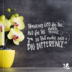 a vase filled with yellow flowers sitting next to a chalkboard wall that says, thanks god for you and for the things you do that make such a big difference