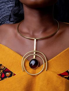 These statement chokers are handcrafted with brass from East Africa, Kenya.  Drawing inspiration from traditional African tribal bib necklaces to create a contemporary necklace for women. Comes in one size and can gently be pulled apart to fit most necks, it only weighs 70g or 0,07 kg. With a width of 15 by 12 cm. Care instructions: gently clean with a cotton fabric and any brass cleaning solution to get the shine back. Express dispatch 1-2 working days Modern Brass Necklace, Unique Brass Choker Jewelry, Statement Choker, Contemporary Necklace, African Necklace, Maasai, Bib Necklaces, African Jewelry, Unique Gifts For Her