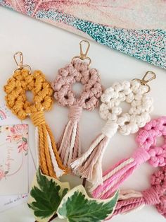 crochet keychains are lined up on a table