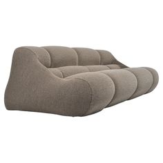 an image of a couch that looks like it is made out of fabric and has four curved