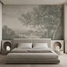 a large bed sitting under a painting on the wall