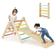 two children playing on a wooden play set