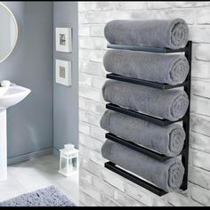 Wall-mounted black towel rack with five tiers Bathroom Towel Storage, Modern Towels, Wall Mounted Towel Holder, Wall Mounted Towel Rack, Regal Design, Towel Holder Bathroom, Steel Bathroom, Towel Racks, Towel Rack Bathroom