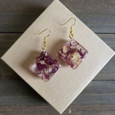 Beautiful Handmade Resin Earrings With Square Resin Pendants Filled With Real Dried Rose Petals, And Vibrant Yellow Wildflower. Natural Flower Earrings, Comfortably Lightweight, And Filled With Natural Beauty Preserved For Eternal Elegance Rose Petal Resin Keychain, Pink Flower Earrings Gift For Her, Pink Flower Crystal Earrings For Gift, Uv Resin Flower Jewelry, Flower Shaped Crystal Earrings With Flower Charm For Gifts, Flower-shaped Crystal Earrings With Flower Charm As Gift, Flower-shaped Crystal Earrings With Flower Charm, Flower Shaped Crystal Earrings With Flower Charm, Pink Drop Flower Earrings As Gift For Her