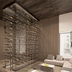 a living room filled with furniture and lots of wine bottles