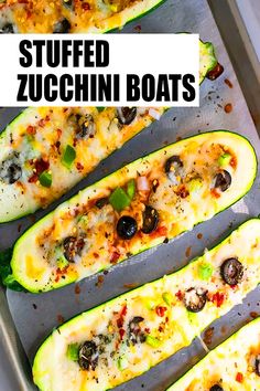 stuffed zucchini boats on a baking sheet with the title overlay reading stuffed zucchini boats