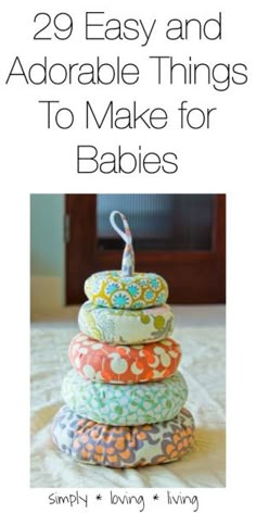 a stack of cloths with the title 29 easy and adorable things to make for babies