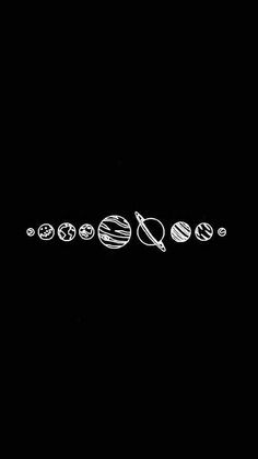 a black and white photo with the words solar system written in chalk on it's side