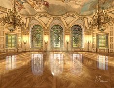 an empty ballroom with chandeliers and stained glass windows