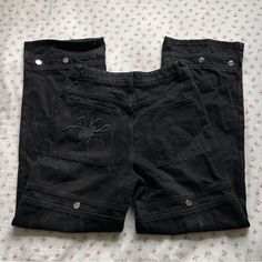 Baggy Skater Cybergoth Y2k Style Jeans From The Brand Persona Lots Of Great Details Like Spider And Brand Embroidery As Well As Rivets And A Distressed Wash Retails 70$ Bnwot Never Worn Did Not Fit Tagged A Size 30 Fits Smaller Like A 29 Flat Across Waist 14.5” Length 30” Embroidered Black Bottoms For Streetwear, Black Embroidered Bottoms For Streetwear, Cybergoth Y2k, Brand Persona, Spider Embroidery, South Pole Jeans, Brand Embroidery, Xmas 2024, Y2k Pants