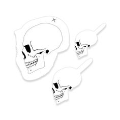 three skull stickers are shown in black and white, with one being pointing at the other