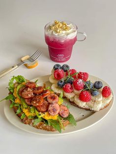 there is a plate with food and a drink on it