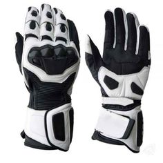 a pair of white and black motorcycle gloves