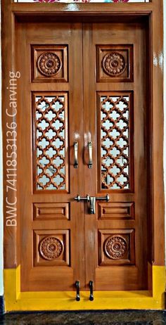 an intricately carved wooden door is shown