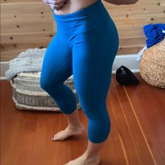 Teal Gapfit Crop Pants Casual Stretch Leggings By Gap, Mid-rise Tight Workout Bottoms, Stretch Cropped Leg Athleisure Bottoms, Stretch Athleisure Cropped Bottoms, Athleisure Stretch Cropped Bottoms, Stretch Blue Pants With Built-in Shorts, Gap Athleisure Yoga Bottoms, Gap Athleisure Pants With Pockets, Athleisure Gap Pants With Pockets