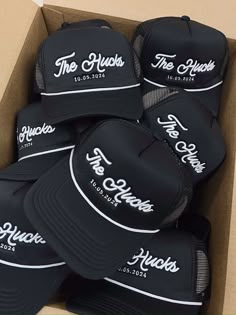 the truckers hats are in a cardboard box