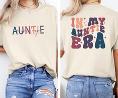 In My Auntie Era Shirt, Auntie Shirt, Aunt Gift, Aunt Era Shirt, Auntie Crewneck, To Be, Auntie Gift From Niece, Eras Shirt, Cool Aunt Shirt We are proud to use premium shirts from Bella Canvas and Gildan Soft Style for our prints. **Bella Canvas - Unisex sizing - Lightweight at 4.2 oz. - Available in various compositions including 100% Combed Cotton, Ring-Spun Cotton, and Polyester blends. **Gildan Soft Style - Unisex sizing - Available in different fabric compositions, including Ring Cotton, Polyester blends, and 100% Ring Cotton. --- **HOW TO ORDER YOUR T-SHIRT** 1. Browse our captivating product photos. 2. Select your preferred style and color from the dropdown menus. 3. Personalize it with your chosen text color. 4. Indicate the desired quantity. 5. Click "ADD TO CART" and proceed wit Auntie T Shirts, Aunt Christmas Gifts Ideas, In My Auntie Era Shirt, In My Auntie Era, Aunt Shirts For Adults, Aunt And Niece Shirts, Auntie And Niece, Auntie Sweatshirt, Auntie Era