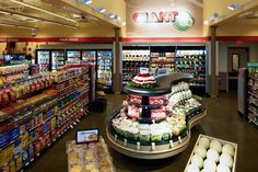 an empty grocery store filled with lots of food