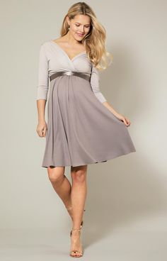 Colour blocking in neutral tones - the ultimate in refined dressing. Our ever-popular Willow Maternity Dress is now available in Almond Truffle. This superbly versatile design is your go-to staple for stylish day wear as well as evening chic. You will love the flattering cross-over neckline with clever gathers along its neckline, the soft stretch empire waist and 3/4 sleeves. Enjoy throughout your pregnancy and after for nursing. Neutral colour block tones Premium soft stretch jersey Empire wais Elegant Fitted V-neck Maternity Dress, Elegant Maternity Dress For Fall, Chic V-neck Maternity Evening Dress, Chic V-neck Evening Maternity Dress, Taupe Fitted V-neck Dress, Elegant V-neck Maternity Dress For Spring, Elegant Maternity Dresses With Surplice Neckline, Elegant Taupe Dress For Party, Elegant Fall Party Maternity Dress