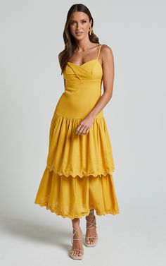 Get ready to turn heads in the Amalie The Label Cameo Linen Blend Low Back Tiered Midi Dress! This stunning dress in warm yellow gold is perfect for any party day or night. With its tiered design and low back, it's a statement piece that will make you feel confident and stylish. Made from a blend of viscose and linen, this dress is not only comfortable but also breathable, making it ideal for those hot summer days. Its sleeveless style adds an extra touch of femininity, while the midi length kee Yellow Colour Palette, Party Business, Warm Yellow, Yellow Colour, Tiered Midi Dress, Sunshine Yellow, Keep It Classy, Viscose Fabric, Tiered Dress