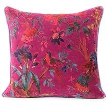 a pink pillow with colorful flowers and leaves on the front, against a white background