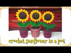 three crochet sunflowers in a pot with the words crochet sunflower in a pot