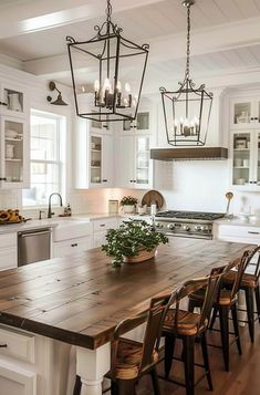 a large wooden table sitting in the middle of a kitchen