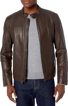 "Revitalize your wardrobe with the Cole Haan Men's Bonded Leather Moto Jacket, now available on Amazon! This versatile piece seamlessly blends style and comfort, making it a must-have for fashion enthusiasts. Crafted with precision, the bonded leather construction of this moto jacket from Cole Haan exudes sophistication and edge. Whether you're a fan of classic leather jackets, adore cozy puffer jackets, or love styling with trendy hoodie outfits, this jacket caters to your diverse fashion preferences. Embrace the urban chic vibe with this timeless piece, designed to complement any look effortlessly. The attention to detail and commitment to quality make the Cole Haan Moto Jacket a standout choice for those who seek both style and substance. Make a fashion statement that reflects your u Hooded Rain Jacket, Men's Leather Jacket, Winter Outfits Men, Leather Moto Jacket, Jacket Design, Men Winter