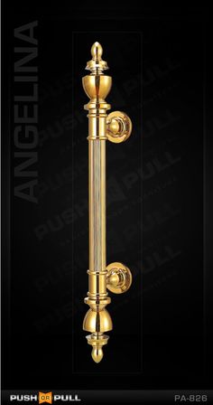 an elegant golden door handle on a black background