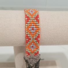 Nwt Chan Luu Beaded Bracelet. Has Oxidized Chain Accents That Dangle At The End. Crochet Ends With Toggle Closure, Bracelet Approx. 7 Inches. Orange, Light Green, Light Blue Seed Beads. Orange Beaded Chain Bracelet As A Gift, Bohemian Orange Beaded Bracelets With Large Beads, Orange Round Beads Friendship Bracelets As Gift, Orange Tiny Beads Friendship Bracelets As Gift, Orange Beaded Friendship Bracelets For Beach, Orange Friendship Bracelets With Colorful Beads, Orange Beaded Bracelets For Jewelry Making, Handmade Orange Friendship Bracelets With Round Beads, Adjustable Orange Beaded Bracelets For Festivals