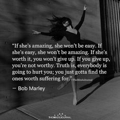 a woman dancing on the sidewalk with a quote from bob marley about she's amazing, she won't be easy