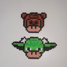 two pieces of pixel art made to look like yoshi from the legend of zelda