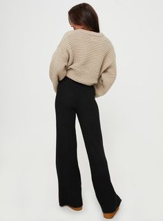 Wide-leg knit pants Thick elasticated waistband Good stretch, unlined  33% reclaimed polyester 23% acrylic 31% polyester 13% nylon Cold hand wash Length of size US 2 / AU 6 waist to hem: 108cm / 42.5in Relaxed Fit Trousers For Winter, Chic Relaxed Fit Bottoms For Winter, Casual Stretch Soft Knit Bottoms, Winter Chic Relaxed Fit Bottoms, Casual Wide Leg Bottoms With Ribbed Cuffs, Relaxed Fit Pants With Ribbed Cuffs For Work, Fall Workwear Pants With Elastic Cuffs, Straight Leg Bottoms With Ribbed Waistband For Work, Workwear Bottoms With Ribbed Waistband And Straight Leg